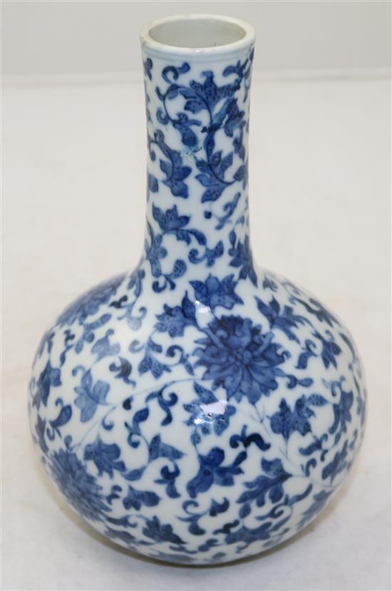 A Chinese blue and white lotus bottle vase, Yongzheng mark, 19th century, 21cm, neck restored